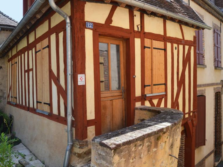 Ravalement de façade au mortier de chaux naturel, entre colombages